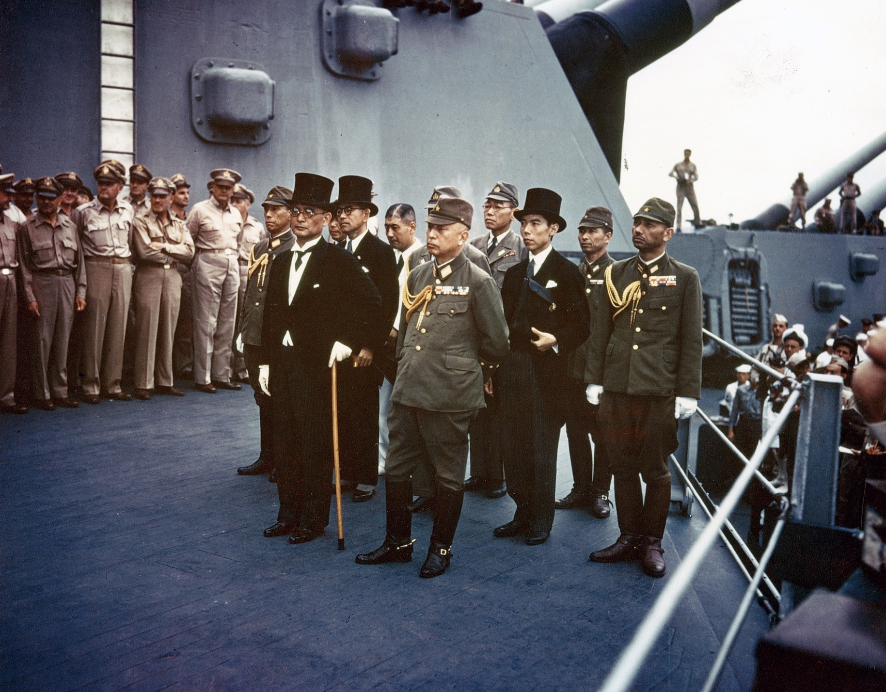 Representatives of the Empire of Japan on board USS Missouri during the surrender ceremonies. Standing in front are: Foreign Minister Mamoru Shigemitsu and General Yoshijirō Umezu, Chief of the Army General Staff. 